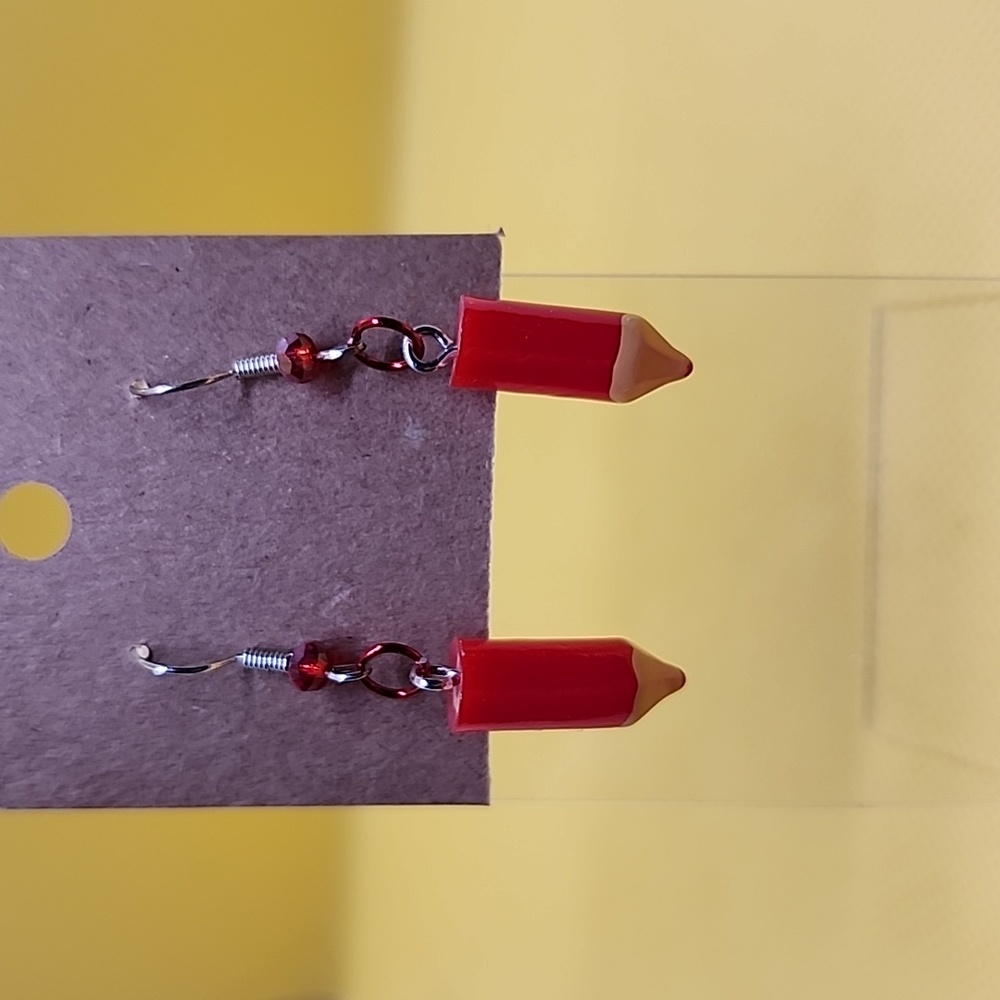 Red colored pencil earrings